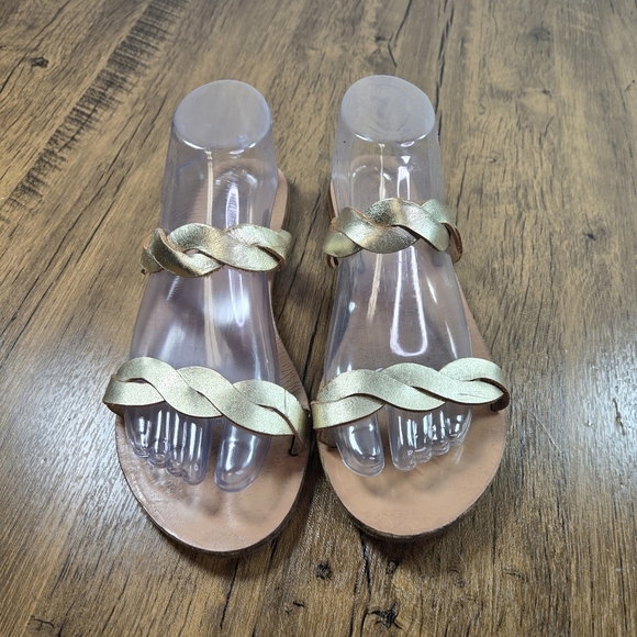 ANCIENT GREEK SANDALS Kardia leather-trimmed raffia sandals  Ancient Greek Sandals Gold Braided Leather Slide Sandals Plaited Straps